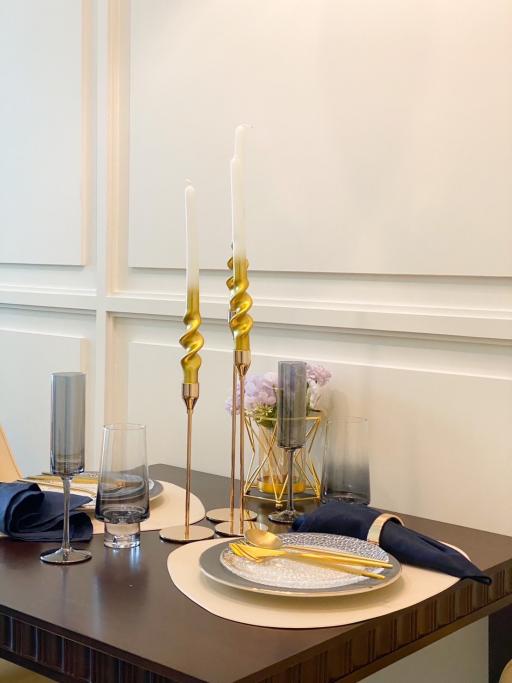Elegantly set dining table with modern decor