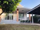 Charming single-story house with a carport and a welcoming front porch