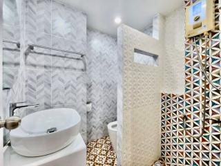 Modern Bathroom Interior with Patterned Tiles