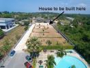 Aerial view of a vacant lot near a swimming pool ready for house construction
