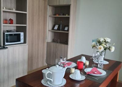 Modern kitchen interior with a wooden dining table set