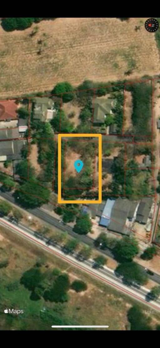 Aerial view of property with surrounding land