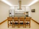 Modern kitchen with dining area and built-in appliances