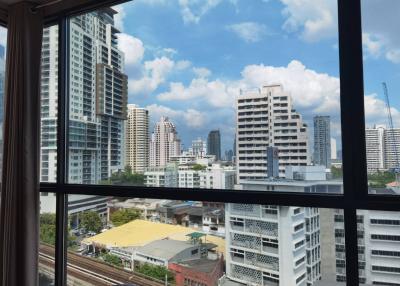 Scenic city skyline view from a high-rise building window