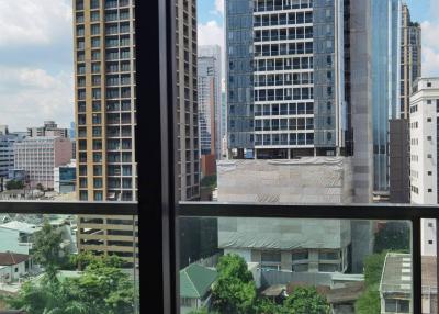 City skyline and neighborhood view from high-rise apartment window