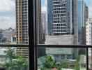 City skyline and neighborhood view from high-rise apartment window