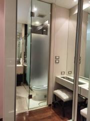 Modern bathroom interior with glass shower and toilet