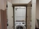 Stacked washing machine and dryer in a small laundry closet