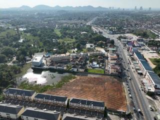 Aerial view of a residential neighborhood with housing developments and surrounding landscape