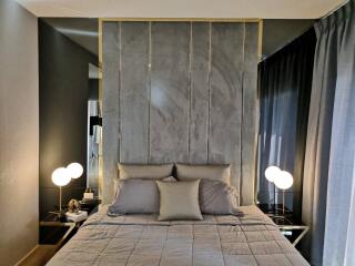 Modern bedroom with a large bed and elegant interior design