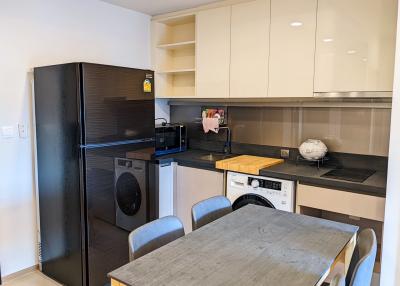 Modern kitchen interior with dining area