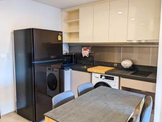 Modern kitchen interior with dining area