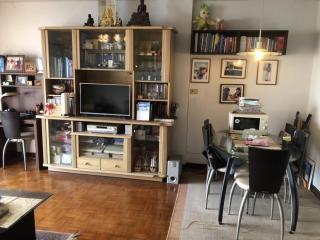 Cozy living room with dining area and entertainment unit