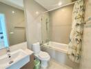 Modern bathroom with shower enclosure and bathtub