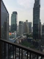 View from balcony overlooking the cityscape with skyscrapers