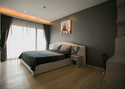 Modern bedroom with a large bed and contemporary design