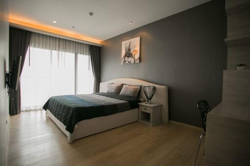 Modern bedroom with a large bed and contemporary design