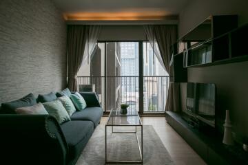 Modern living room with comfortable seating and natural light