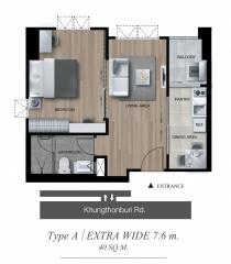 Floor plan of a modern apartment layout showing living area, bedroom, kitchen, bathroom, and balcony