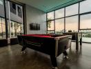Spacious recreation room with pool table and modern design