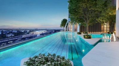 Luxurious rooftop swimming pool with city view at dusk