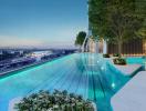 Luxurious rooftop swimming pool with city view at dusk