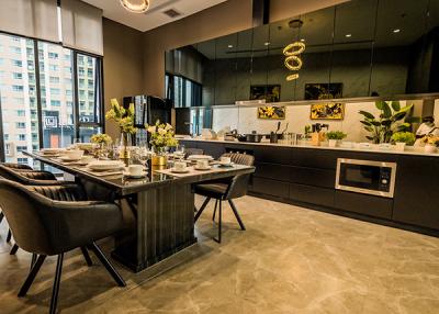 Modern kitchen and dining area with city view