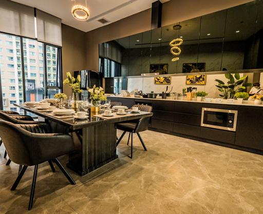 Modern kitchen and dining area with city view