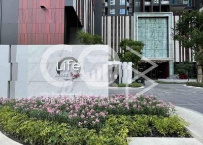 Luxurious Residential Building Entrance with Landscaped Garden