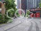 Exterior view of a modern apartment complex with designated pathway and lush landscaping