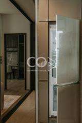 Modern corridor design with elegant doors and frosted glass panels