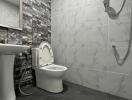 Modern bathroom with marble tiles and elegant fixtures