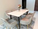 Modern dining room with stylish table and comfortable chairs