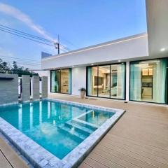 Contemporary home with outdoor swimming pool and wooden deck