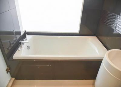 Modern bathroom interior with white bathtub