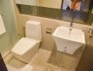 Modern bathroom interior with tiled walls and flooring