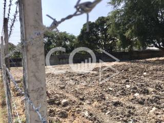 Barren Land with Barbed Wire Fencing