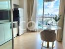 Modern kitchen with cityscape view through floor-to-ceiling windows