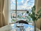 Cozy living room with a scenic city view through large windows