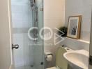Contemporary white tiled bathroom with shower and toilet