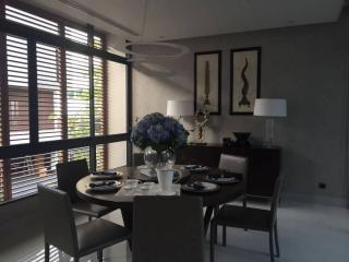 Elegant dining room with natural light and modern decor