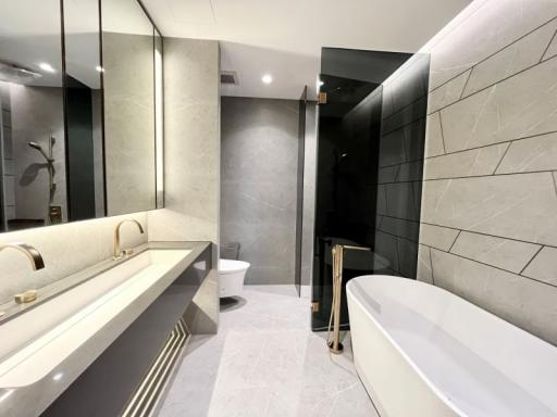 Modern bathroom with elegant fixtures and neutral tones