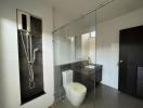 Modern spacious bathroom with a glass shower enclosure