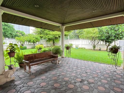 Spacious covered patio with garden view