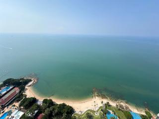 Aerial view of beachfront near residential area