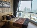 Modern bedroom with city skyline view