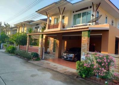 Spacious two-story house with covered parking and balcony