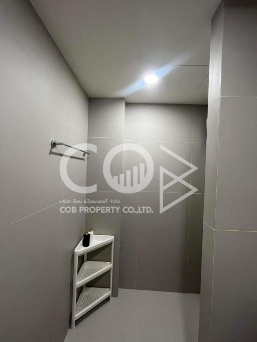 Modern bathroom interior with gray tiles