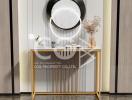 Modern entryway with elegant console table and round mirror