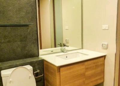 Modern bathroom interior with toilet and sink